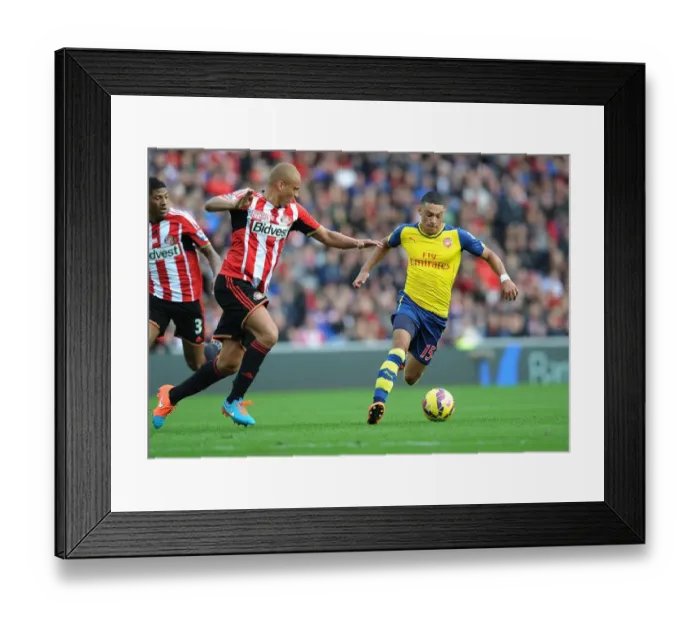Framed Print : Arsenal's Alex Oxlade-Chamberlain Surges Past Sunderland's Wes Brown Framed Print : Arsenal's Alex Oxlade-Chamberlain Surges Past Sunderland's Wes Brown