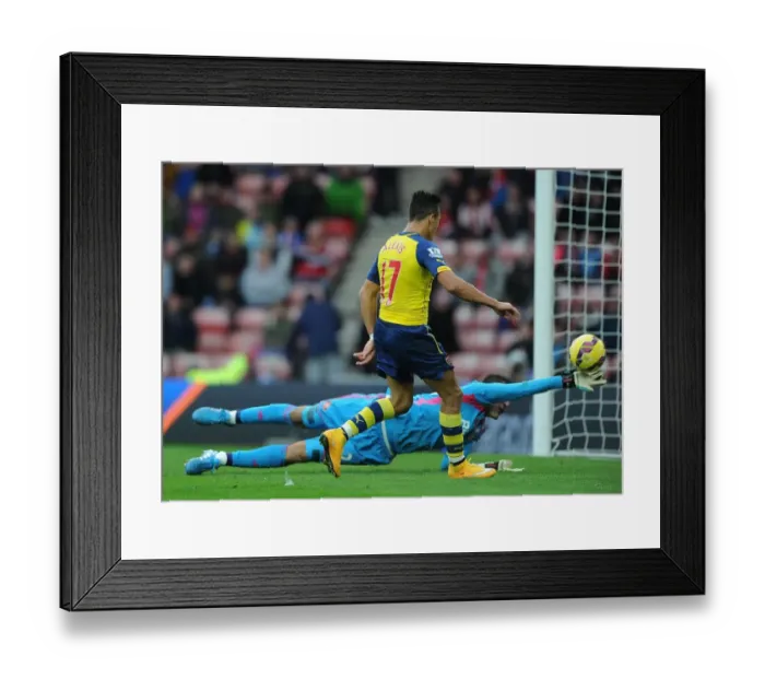 Framed Print : Alexis Sanchez Scores Stunning Chip Over Mannone in Sunderland vs Arsenal (2014 / 15) Framed Print : Alexis Sanchez Scores Stunning Chip Over Mannone in Sunderland vs Arsenal (2014 / 15)