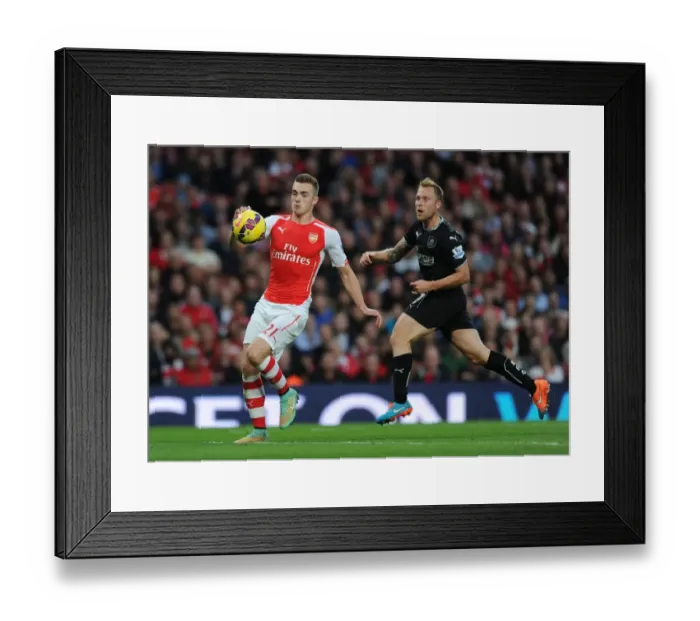 Framed Print : Arsenal's Calum Chambers Outruns Burnley's Scott Arfield in 2014 / 15 Premier League Clash