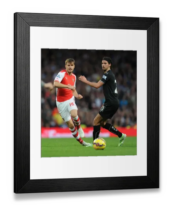 Framed Print : Arsenal vs Burnley: Ramsey vs Boyd - Intense Battle in the Premier League Framed Print : Arsenal vs Burnley: Ramsey vs Boyd - Intense Battle in the Premier League