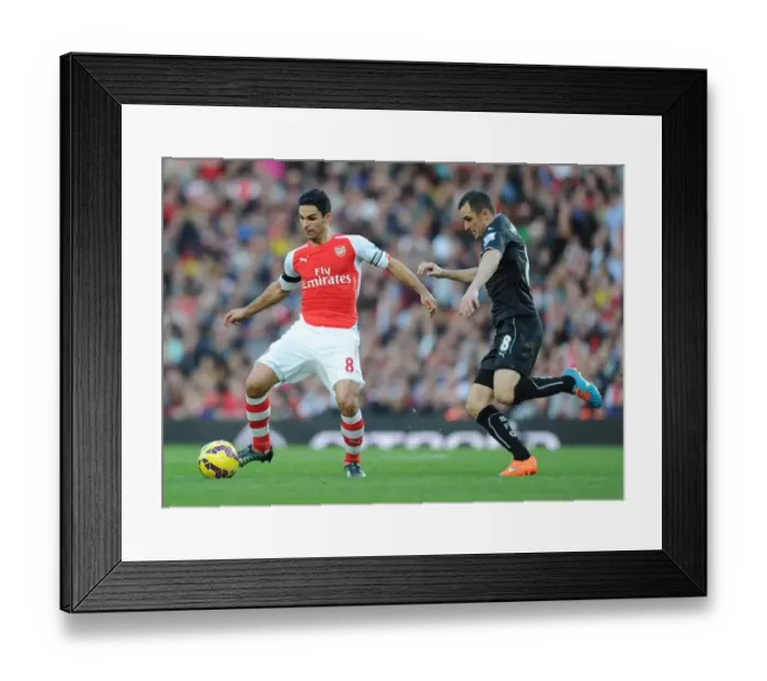 Framed Print : Mikel Arteta Breaks Past Burnley's Dean Marney in Arsenal's Premier League Clash (Arsenal v Burnley 2014 / 15)