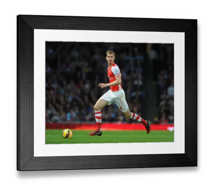 Framed Print : Per Mertesacker in Action: Arsenal vs Burnley, Premier League 2014 / 15