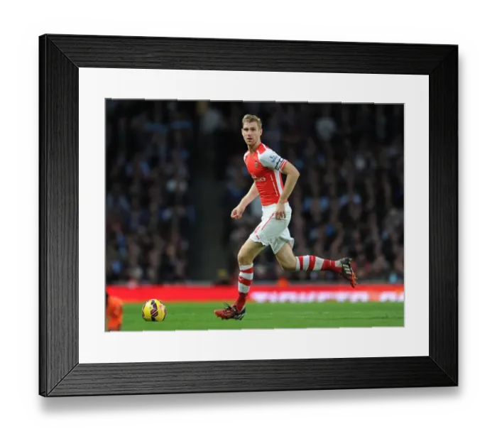 Framed Print : Per Mertesacker's Unwavering Focus: Arsenal's Triumph Over Burnley (2014 / 15)