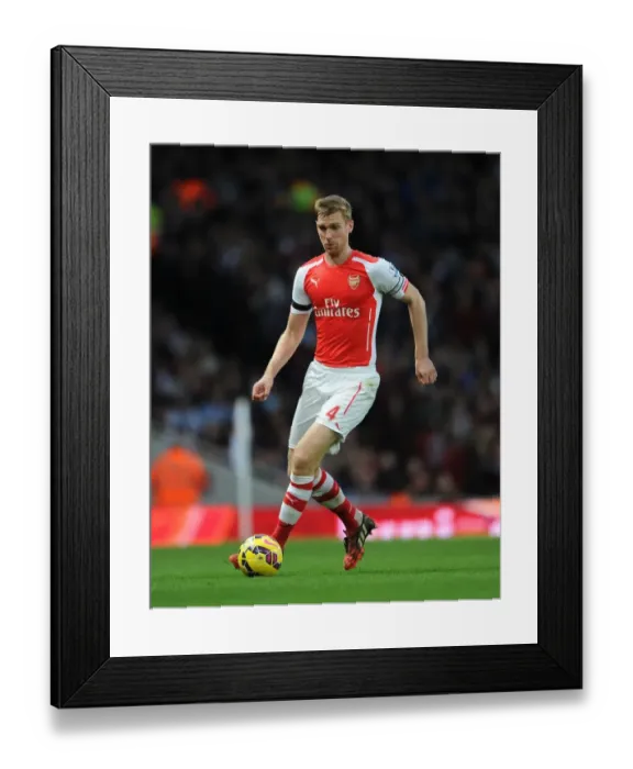 Framed Print : Per Mertesacker's Unwavering Focus: Arsenal's Triumph Over Burnley (2014 / 15)