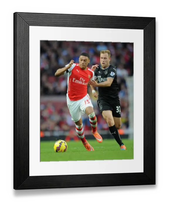 Framed Print : Intense Face-Off: Oxlade-Chamberlain vs Arfield in Arsenal's Premier League Clash
