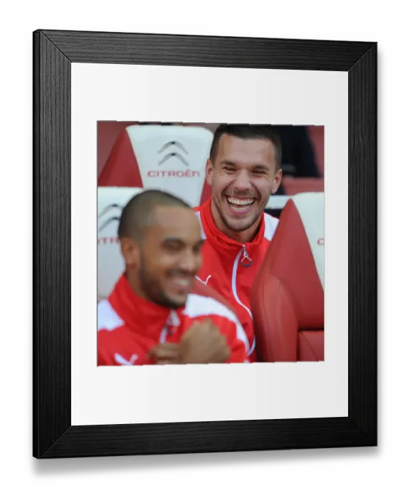 Framed Print : Lukas Podolski (Arsenal). Arsenal 3: 0 Burnley. Barclays Premier League. Emirates Stadium, 1  /  11  /  14