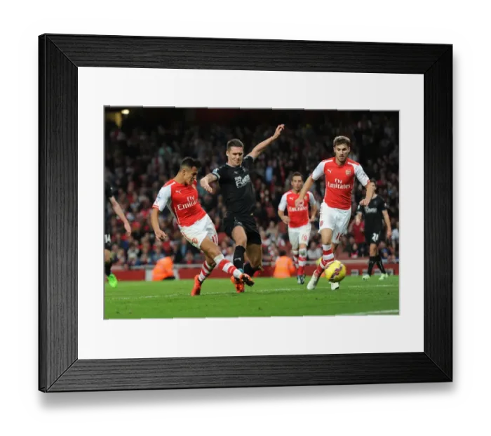 Framed Print : Alexis Sanchez Scores Dramatic Goal Past Jason Shackell in Arsenal's Victory over Burnley