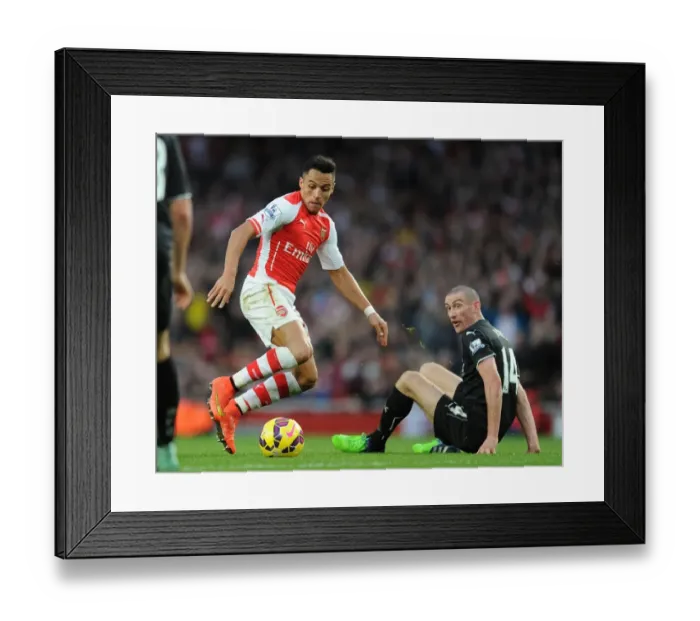 Framed Print : Arsenal's Alexis Sanchez Faces Off Against Burnley's David Jones in Premier League Clash