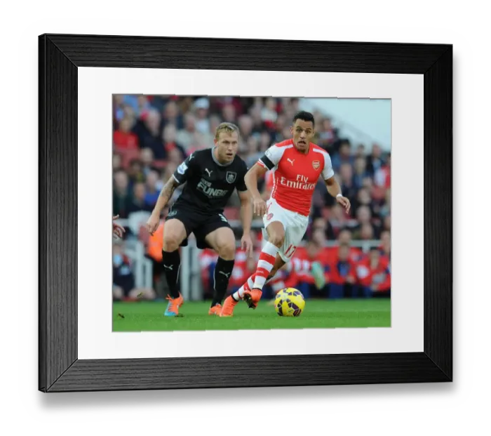 Framed Print : Intense Rivalry: Alexis Sanchez vs. Scott Arfield - Arsenal's Battle Against Burnley Framed Print : Intense Rivalry: Alexis Sanchez vs. Scott Arfield - Arsenal's Battle Against Burnley