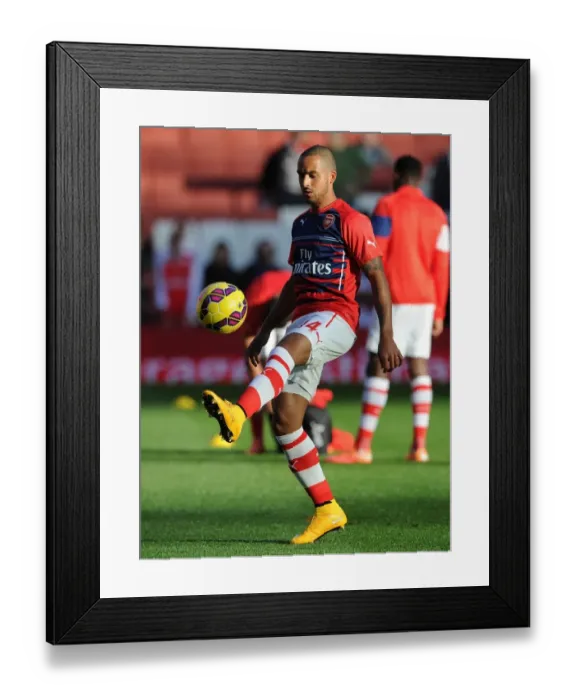 Framed Print : Theo Walcott's Focus: Arsenal Star's Pre-Game Routine before Taking on Burnley, Premier League 2014