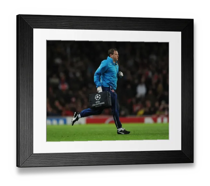 Framed Print : Arsenal FC vs RSC Anderlecht: Colin Lewin Tends to Injured Player in UEFA Champions League Match, Emirates Stadium, London, 2014 Framed Print : Arsenal FC vs RSC Anderlecht: Colin Lewin Tends to Injured Player in UEFA Champions League Match, Emirates Stadium, London, 2014