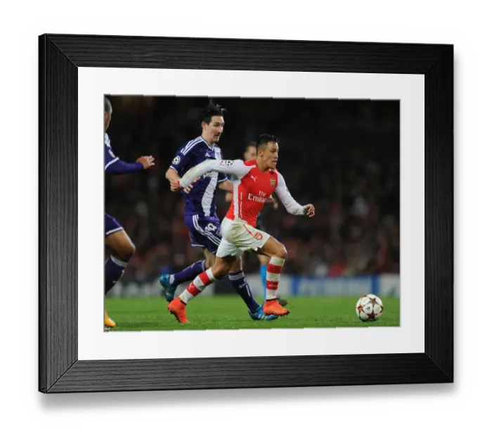 Framed Print : Arsenal's Alexis Sanchez Outmaneuvers Sacha Kljestan in 2014 Champions League Clash