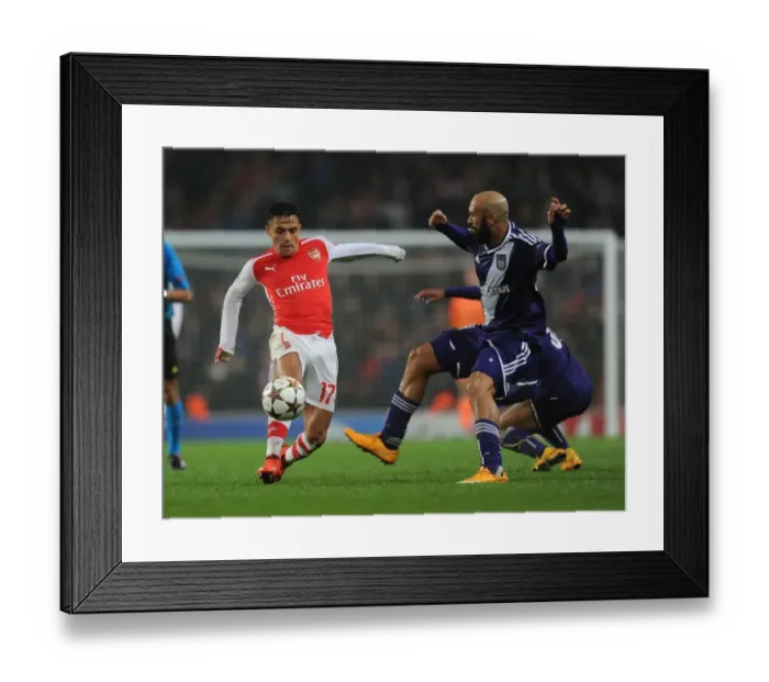 Framed Print : Clash of Stars: Sanchez vs. Vanden Borre in Arsenal's UEFA Champions League Battle