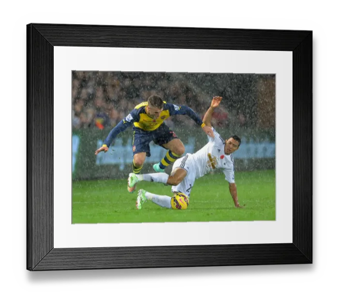 Framed Print : Calum Chambers Leaps Past Jefferson Montero: Swansea vs Arsenal, Premier League 2014-15 Framed Print : Calum Chambers Leaps Past Jefferson Montero: Swansea vs Arsenal, Premier League 2014-15