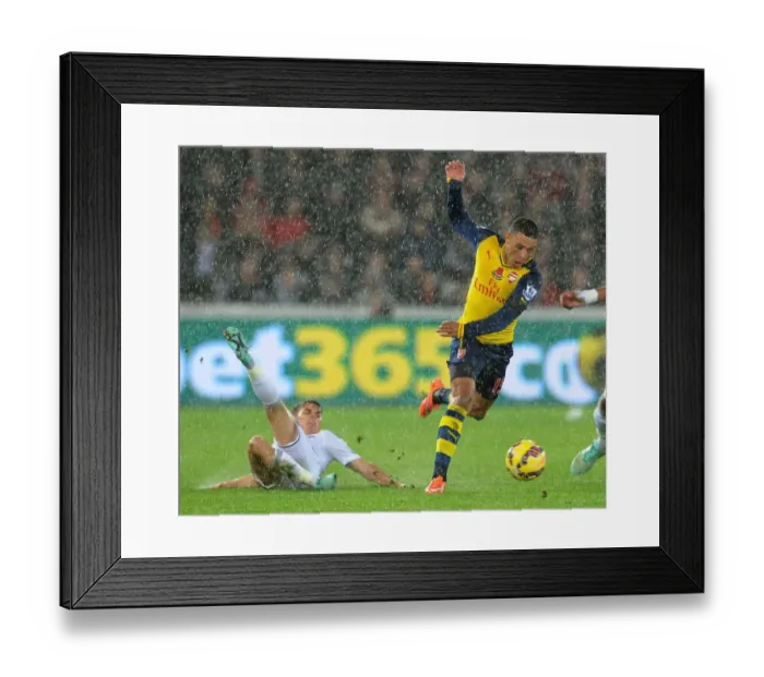 Framed Print : Alex Oxlade-Chamberlain vs Tom Carroll: Intense Battle in Swansea v Arsenal (2014-15) Framed Print : Alex Oxlade-Chamberlain vs Tom Carroll: Intense Battle in Swansea v Arsenal (2014-15)