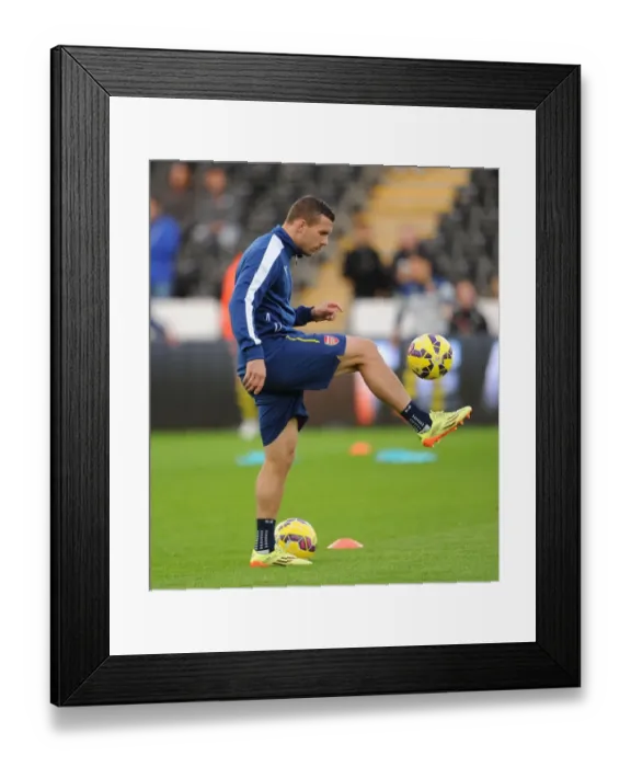 Framed Print : Lukas Podolski: Arsenal Star's Pre-Match Focus at Swansea (2014-15) Framed Print : Lukas Podolski: Arsenal Star's Pre-Match Focus at Swansea (2014-15)
