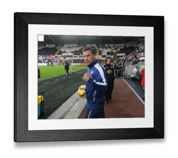 Framed Print : Lukas Podolski: Arsenal Forward's Pre-Match Focus Ahead of Swansea Showdown (2014-15) Framed Print : Lukas Podolski: Arsenal Forward's Pre-Match Focus Ahead of Swansea Showdown (2014-15)