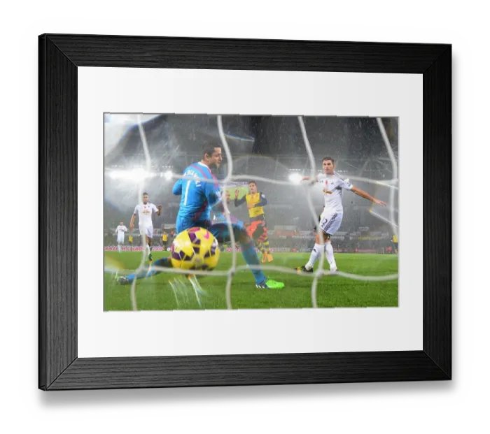 Framed Print : Alexis Sanchez Scores Against Former Team Mate Lukasz Fabianski: Swansea vs. Arsenal, 2014-15 Premier League