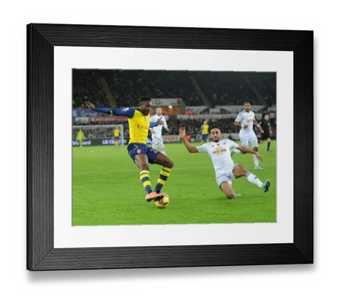 Framed Print : Danny Welbeck vs. Neil Taylor: Intense Battle at Swansea's Liberty Stadium (Arsenal vs. Swansea, Premier League 2014-15) Framed Print : Danny Welbeck vs. Neil Taylor: Intense Battle at Swansea's Liberty Stadium (Arsenal vs. Swansea, Premier League 2014-15)