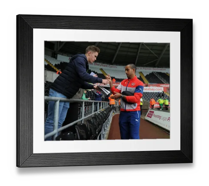 Framed Print : Theo Walcott at Swansea: Arsenal Star Signs Autographs Ahead of Premier League Clash