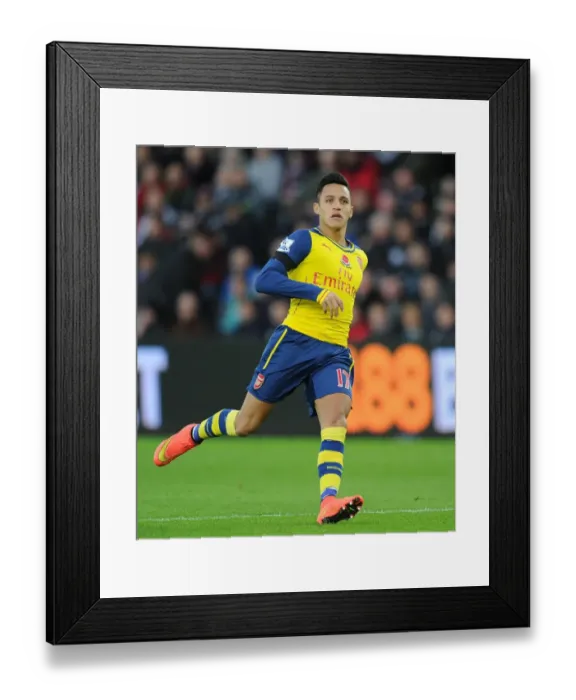 Framed Print : Arsenal's Alexis Sanchez in Action Against Swansea City (2014-15) Framed Print : Arsenal's Alexis Sanchez in Action Against Swansea City (2014-15)