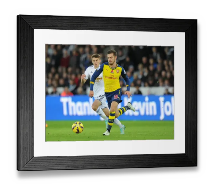 Framed Print : Aaron Ramsey Outmaneuvers Tom Carroll: Swansea vs Arsenal, Premier League 2014-15