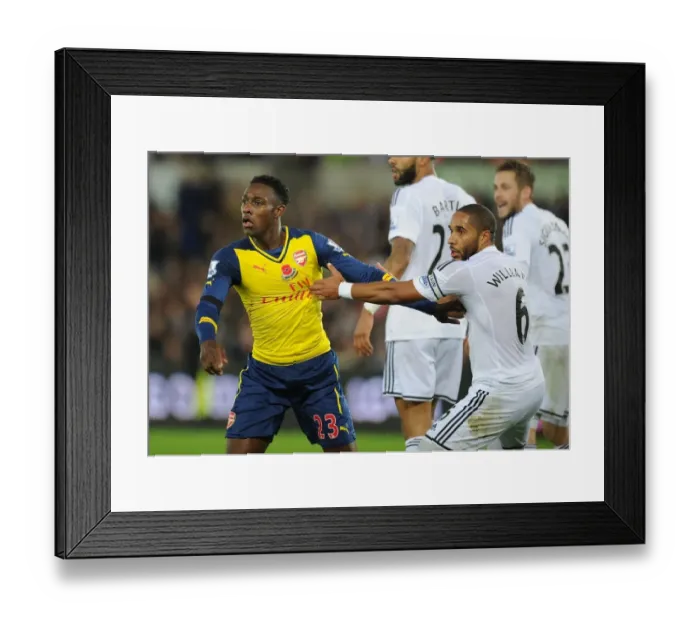 Framed Print : Clash of Titans: Welbeck vs. Williams in Swansea's Battle Against Arsenal