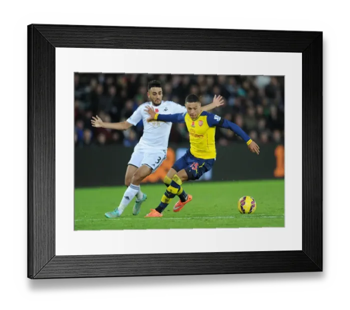Framed Print : Clash at Liberty: Oxlade-Chamberlain vs. Taylor - Swansea vs. Arsenal, Premier League 2014-15 Framed Print : Clash at Liberty: Oxlade-Chamberlain vs. Taylor - Swansea vs. Arsenal, Premier League 2014-15