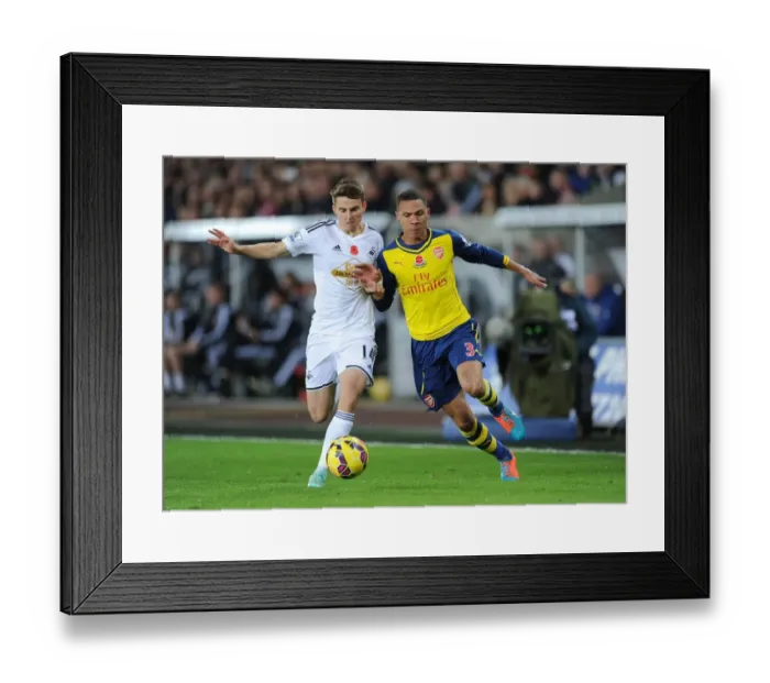 Framed Print : Clash at Liberty: Gibbs vs. Carroll - Swansea vs. Arsenal, 2014-15 Premier League Framed Print : Clash at Liberty: Gibbs vs. Carroll - Swansea vs. Arsenal, 2014-15 Premier League
