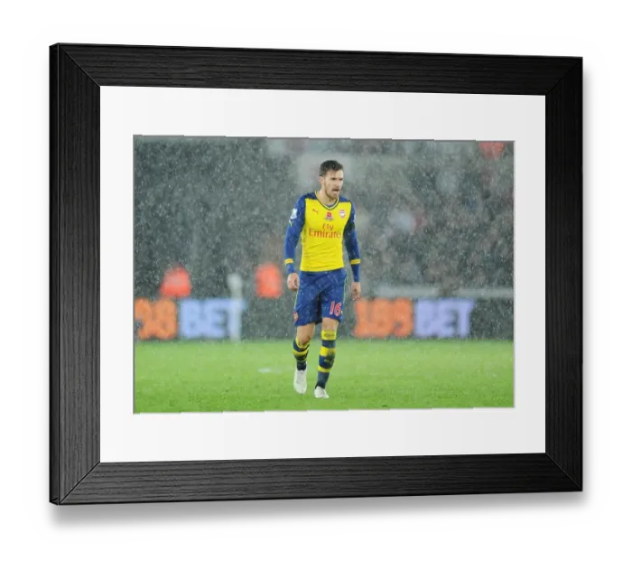 Framed Print : Aaron Ramsey in Action: Swansea vs Arsenal, Premier League 2014-15 Framed Print : Aaron Ramsey in Action: Swansea vs Arsenal, Premier League 2014-15