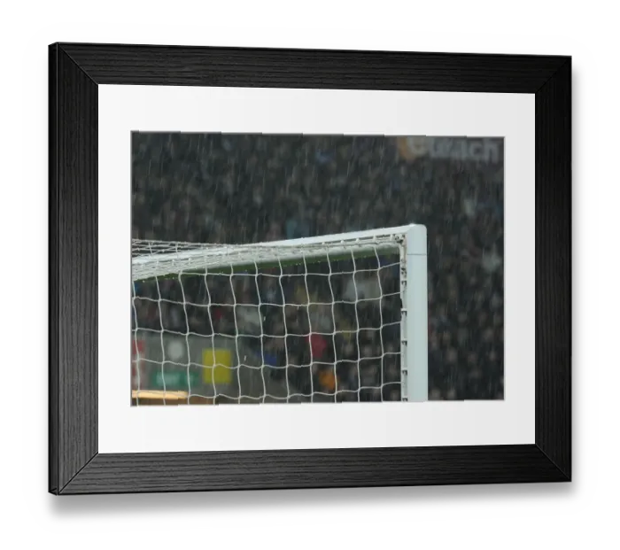 Framed Print : Arsenal in the Rain: Swansea City vs Arsenal, Premier League 2014-15 Framed Print : Arsenal in the Rain: Swansea City vs Arsenal, Premier League 2014-15