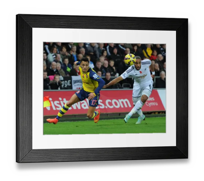 Framed Print : Clash of Titans: Sanchez vs. Williams - Swansea v Arsenal, 2014-15 Premier League Framed Print : Clash of Titans: Sanchez vs. Williams - Swansea v Arsenal, 2014-15 Premier League