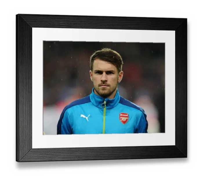 Framed Print : Aaron Ramsey (Arsenal). Arsenal 3: 3 Anderlecht. UEFA Champions League. Group D. Emirates Stadium