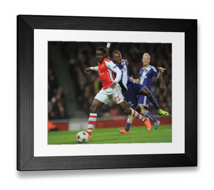 Framed Print : Arsenal vs. Anderlecht: Penalty Drama as Welbeck Fouls Mbemba