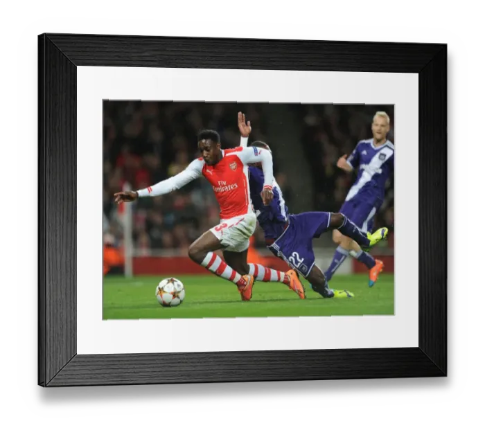 Framed Print : Arsenal's Danny Welbeck Fouls by Chancel Mbemba: Penalty Called in UEFA Champions League Match Framed Print : Arsenal's Danny Welbeck Fouls by Chancel Mbemba: Penalty Called in UEFA Champions League Match