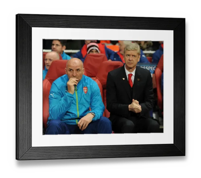 Framed Print : Arsene Wenger and Steve Bould: Focused United Ahead of Arsenal's Champions League Showdown (2014 / 15) Framed Print : Arsene Wenger and Steve Bould: Focused United Ahead of Arsenal's Champions League Showdown (2014 / 15)