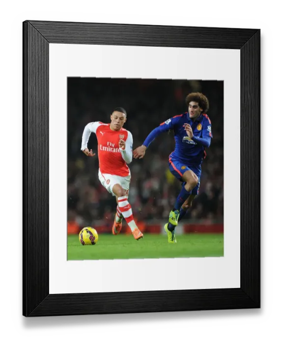 Framed Print : Arsenal vs Manchester United: Oxlade-Chamberlain vs Fellaini Clash in the Premier League Framed Print : Arsenal vs Manchester United: Oxlade-Chamberlain vs Fellaini Clash in the Premier League