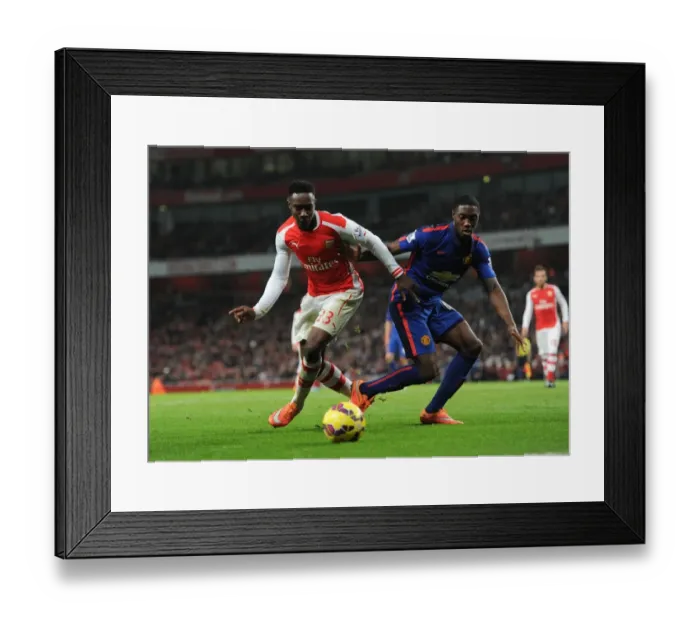 Framed Print : Arsenal's Danny Welbeck Battles Manchester United's Tyler Blackett in Premier League Clash