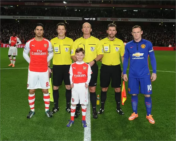 Arsenal vs Manchester United: Premier League Showdown - Mikel Arteta and Wayne Rooney Lead Teams Out at Emirates Stadium (November 2014)