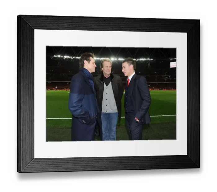 Framed Print : Arsenal's Koscielny Meets Jim Carrey and Jeff Daniels Before Arsenal v Manchester United Match
