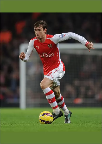 Arsenal vs Manchester United: Nacho Monreal in Action at the Emirates Stadium (2014-15)
