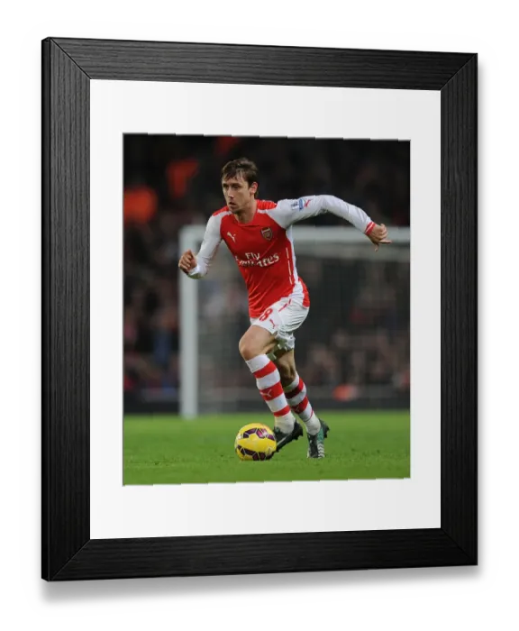 Framed Print : Arsenal vs Manchester United: Nacho Monreal in Action at the Emirates Stadium (2014-15)