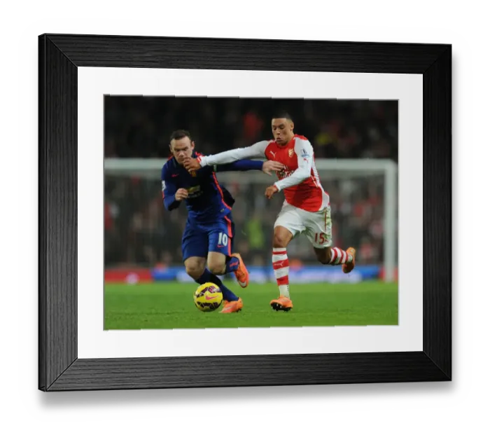Framed Print : Clash of Stars: Oxlade-Chamberlain vs. Rooney - Arsenal vs. Manchester United (2014-15) Framed Print : Clash of Stars: Oxlade-Chamberlain vs. Rooney - Arsenal vs. Manchester United (2014-15)