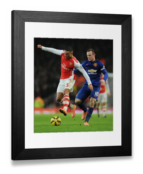 Framed Print : Clash of Stars: Oxlade-Chamberlain vs Rooney - Arsenal vs Manchester United (2014-15) Framed Print : Clash of Stars: Oxlade-Chamberlain vs Rooney - Arsenal vs Manchester United (2014-15)