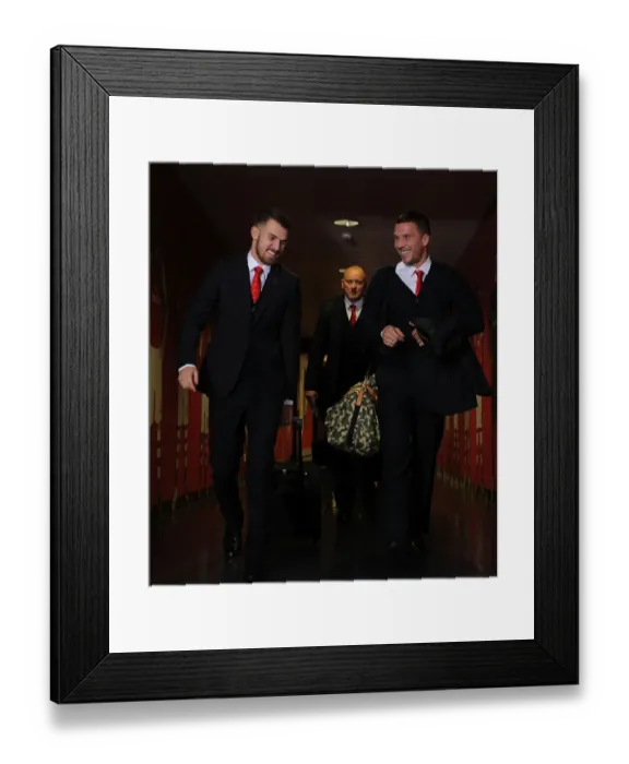 Framed Print : Arsenal Players Aaron Ramsey and Lukas Podolski in the Tunnel Before Arsenal v Manchester United (2014-15)