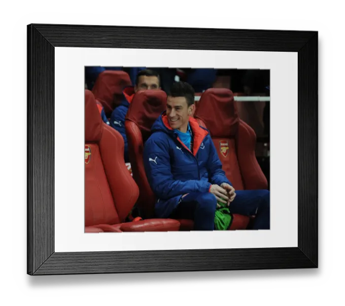 Framed Print : Arsenal's Laurent Koscielny Prepares for Borussia Dortmund Clash in the UEFA Champions League Framed Print : Arsenal's Laurent Koscielny Prepares for Borussia Dortmund Clash in the UEFA Champions League