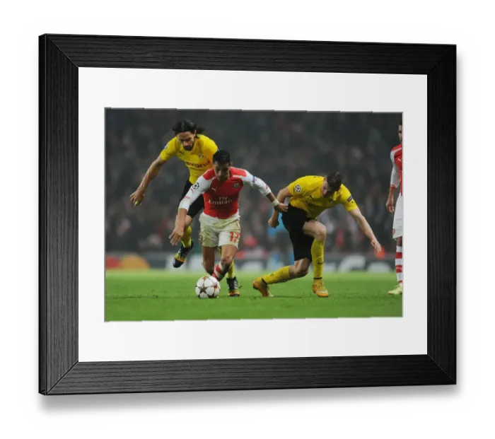 Framed Print : Arsenal vs. Borussia Dortmund: Intense Clash in the UEFA Champions League Framed Print : Arsenal vs. Borussia Dortmund: Intense Clash in the UEFA Champions League