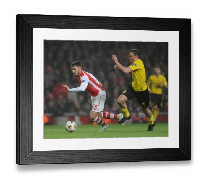Framed Print : Arsenal's Ramsey Clashes with Dortmund's Grosskreutz in Champions League Showdown Framed Print : Arsenal's Ramsey Clashes with Dortmund's Grosskreutz in Champions League Showdown