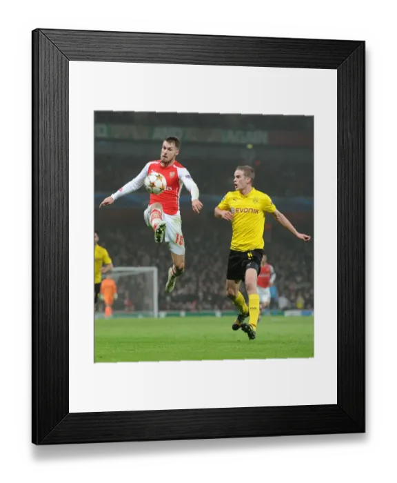Framed Print : Arsenal vs. Borussia Dortmund: A Champions League Showdown Framed Print : Arsenal vs. Borussia Dortmund: A Champions League Showdown