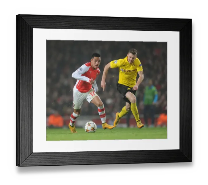 Framed Print : Clash of Stars: Sanchez vs. Piszczek - Arsenal vs. Borussia Dortmund, UEFA Champions League
